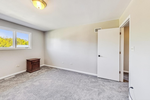 868 Bonnie Brae Ln, Bolingbrook, IL 60440 - carpeted empty room with baseboards and visible vents