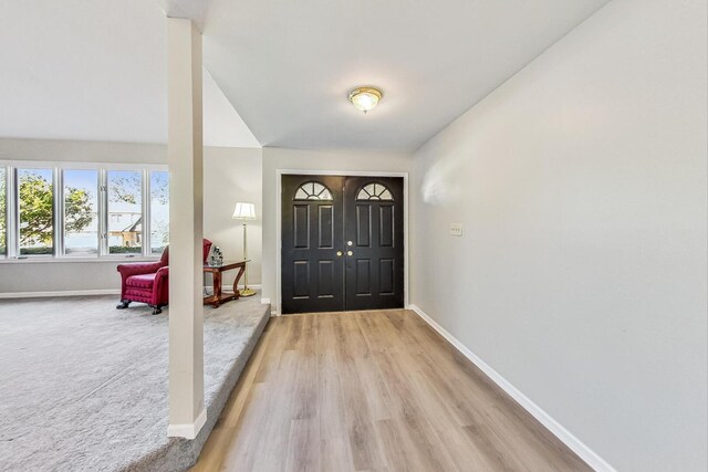 868 Bonnie Brae Ln, Bolingbrook, IL 60440 - foyer featuring baseboards and light wood-style floors