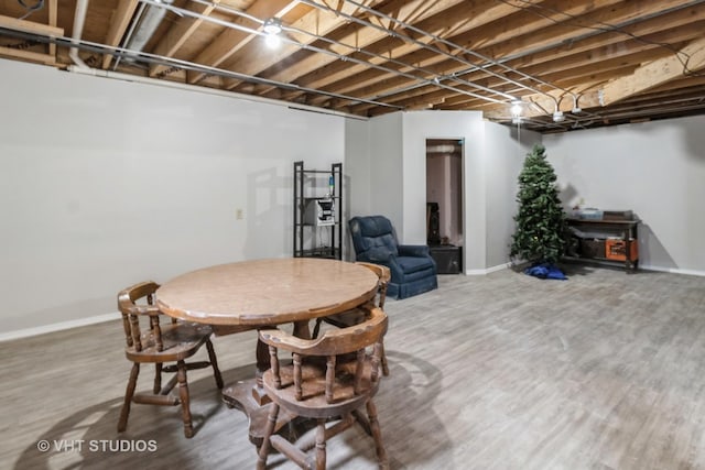 868 Bonnie Brae Ln, Bolingbrook, IL 60440 - dining room with baseboards and wood finished floors