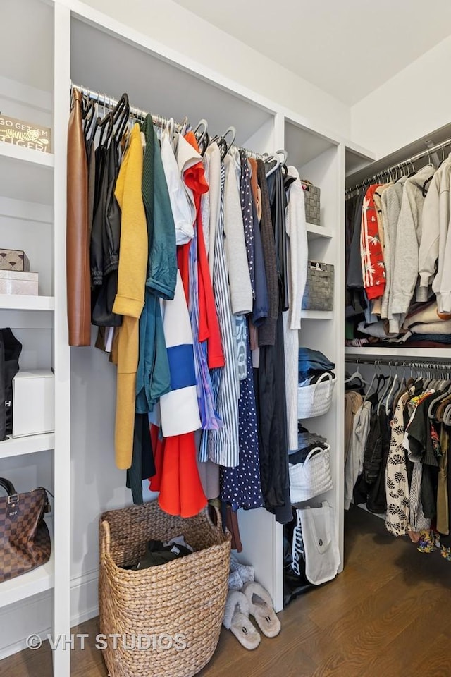 walk in closet featuring wood finished floors