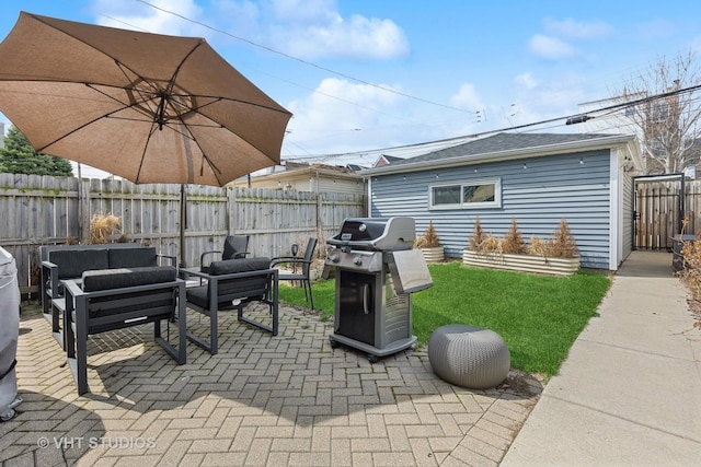 view of patio / terrace with an outdoor living space, a fenced backyard, and a grill