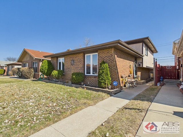 439 Hoxie Ave, Calumet City, IL 60409 - view of front of property with a front lawn and brick siding