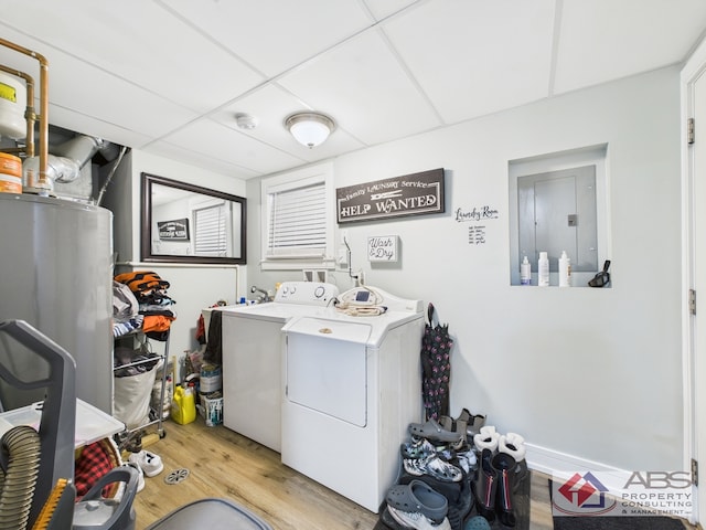 439 Hoxie Ave, Calumet City, IL 60409 - washroom featuring light wood-type flooring, washer and clothes dryer, electric panel, water heater, and laundry area