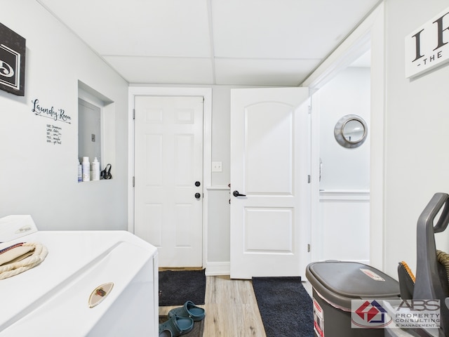 439 Hoxie Ave, Calumet City, IL 60409 - bathroom featuring a paneled ceiling, washer / dryer, and wood finished floors