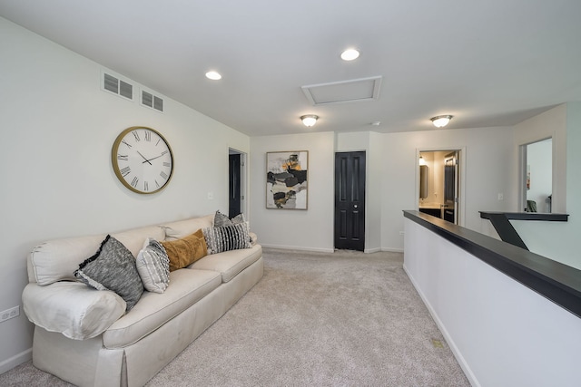 213 Dorset Ave, Oswego, IL 60543 - living area with attic access, light carpet, and recessed lighting