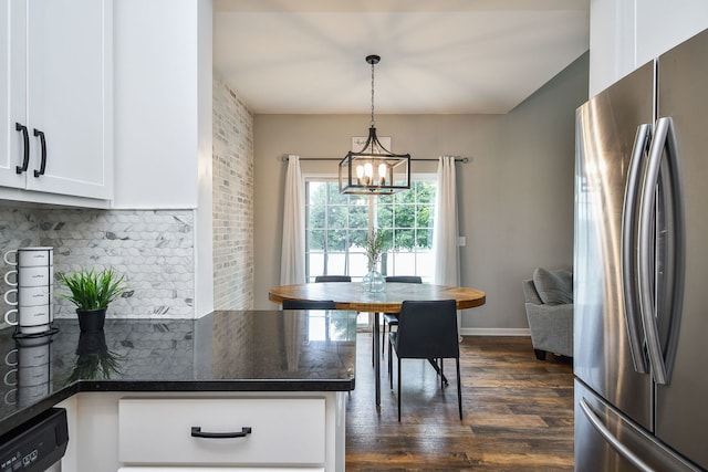 213 Dorset Ave, Oswego, IL 60543 - kitchen featuring freestanding refrigerator, dark wood-style floors, tasteful backsplash, white cabinetry, and a chandelier