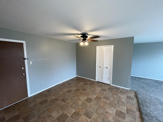 300 Park Ave Unit 236, Calumet City, IL 60409 - spare room featuring baseboards and a ceiling fan