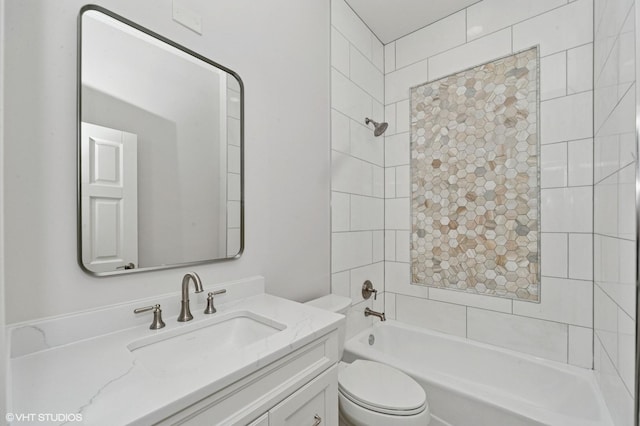 full bathroom with bathtub / shower combination, toilet, and vanity