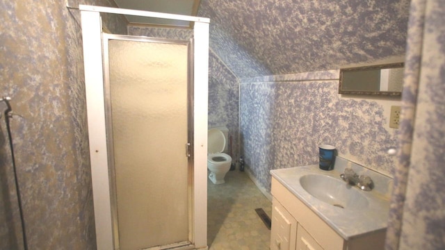309 W 5th St, Minonk, IL 61760 - full bath featuring a stall shower, vanity, toilet, and wallpapered walls