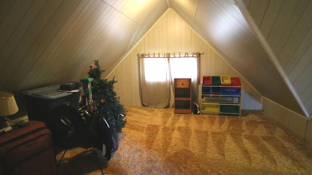 309 W 5th St, Minonk, IL 61760 - additional living space featuring vaulted ceiling, carpet, and wooden walls