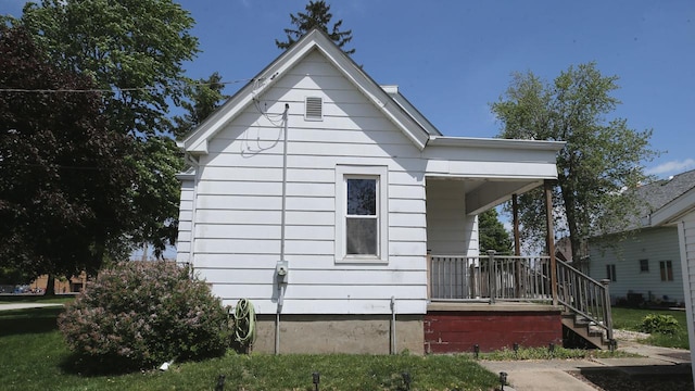 309 W 5th St, Minonk, IL 61760 - view of property exterior featuring covered porch