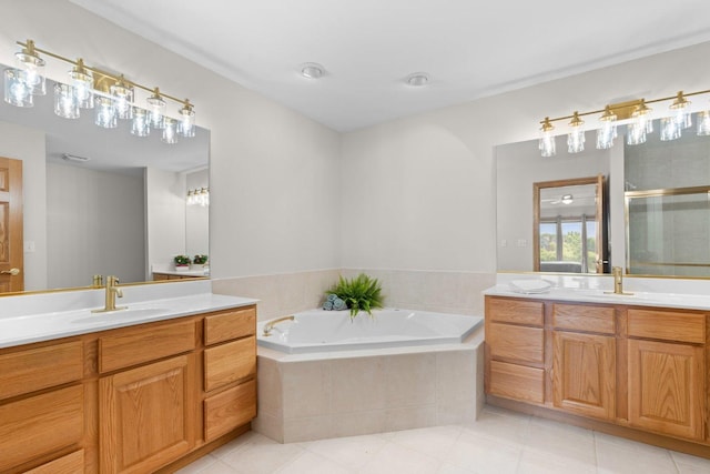 828 Wedgewood Dr, Crystal Lake, IL 60014 - full bathroom featuring two vanities, a bath, tile patterned flooring, and a stall shower