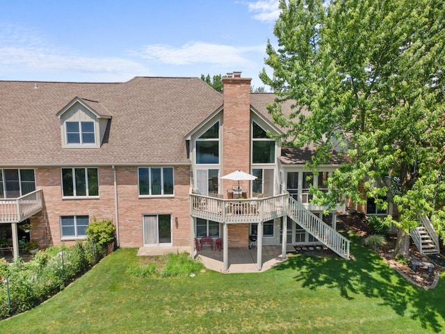 828 Wedgewood Dr, Crystal Lake, IL 60014 - rear view of house with stairs, a patio area, a chimney, a shingled roof, and brick siding