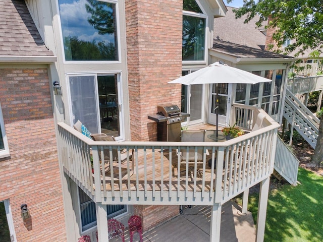828 Wedgewood Dr, Crystal Lake, IL 60014 - deck featuring stairway, area for grilling, and a sunroom