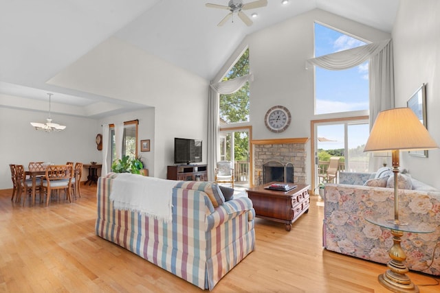 828 Wedgewood Dr, Crystal Lake, IL 60014 - living area with a chandelier, high vaulted ceiling, light wood-type flooring, plenty of natural light, and recessed lighting