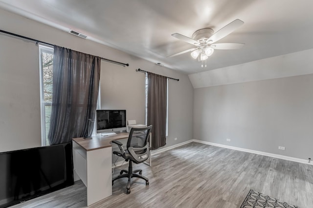 4115 W Dickens Ave, Chicago, IL 60639 - home office featuring visible vents, baseboards, ceiling fan, vaulted ceiling, and light wood-style flooring