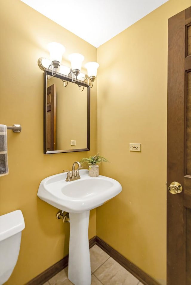 915 N Saratoga Dr, Palatine, IL 60074 - bathroom featuring tile patterned flooring, toilet, and baseboards