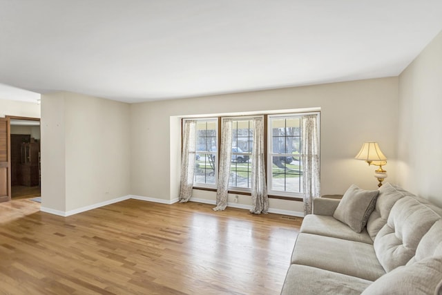 915 N Saratoga Dr, Palatine, IL 60074 - living room with baseboards and light wood-style flooring