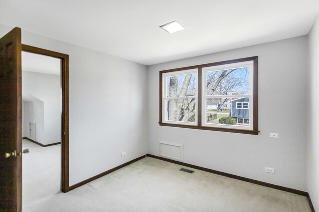 915 N Saratoga Dr, Palatine, IL 60074 - empty room featuring baseboards, visible vents, and light colored carpet