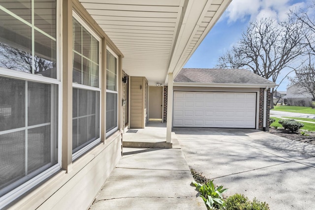 915 N Saratoga Dr, Palatine, IL 60074 - view of patio with an attached garage and driveway