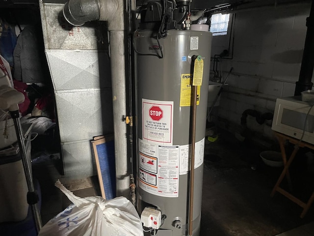 221 Heine Ave, Elgin, IL 60123 - utility room featuring gas water heater