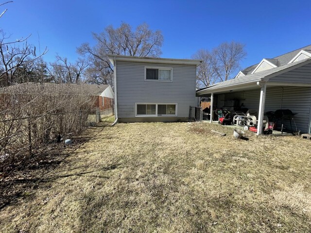 221 Heine Ave, Elgin, IL 60123 - rear view of house with fence