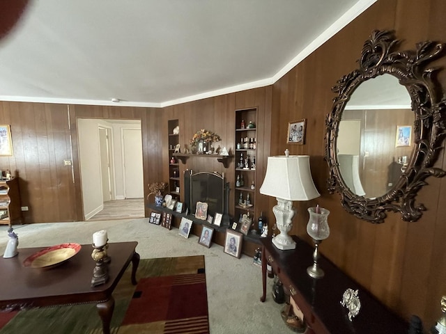 221 Heine Ave, Elgin, IL 60123 - living room with crown molding, built in features, carpet, and wood walls
