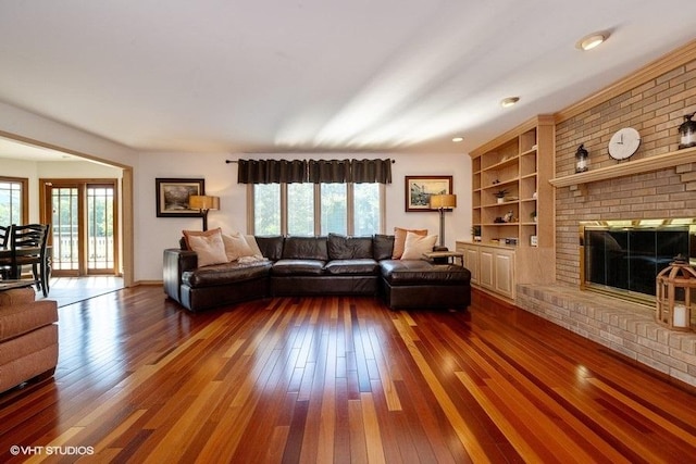 307 Anne Ct, Prospect Heights, IL 60070 - living area featuring healthy amount of natural light, hardwood / wood-style floors, and a fireplace