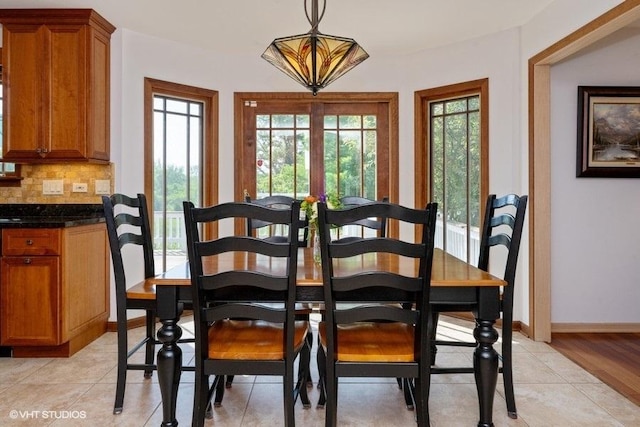 307 Anne Ct, Prospect Heights, IL 60070 - dining room with healthy amount of natural light and light tile patterned floors