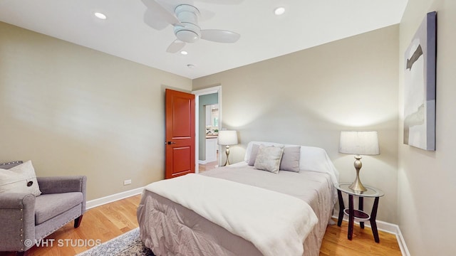 bedroom featuring baseboards, ceiling fan, recessed lighting, and light wood-style flooring