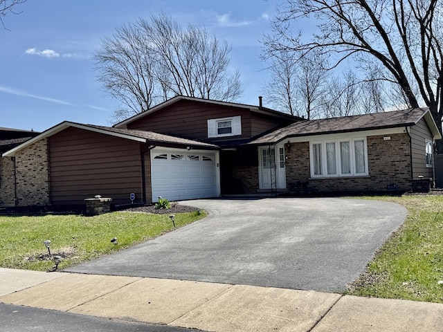 5125 Imperial Dr, Richton Park, IL 60471 - tri-level home featuring driveway, a front yard, and brick siding