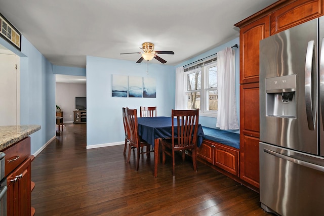 1215 Stratford Dr W, Bourbonnais, IL 60914 - dining area featuring baseboards, visible vents, dark wood-type flooring, and a ceiling fan