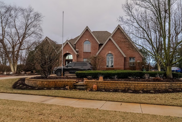 view of front of property with brick siding