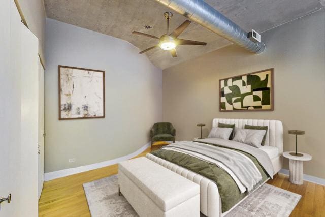 110 N Peoria St Unit 205, Chicago, IL 60607 - bedroom featuring wood finished floors, baseboards, and a ceiling fan