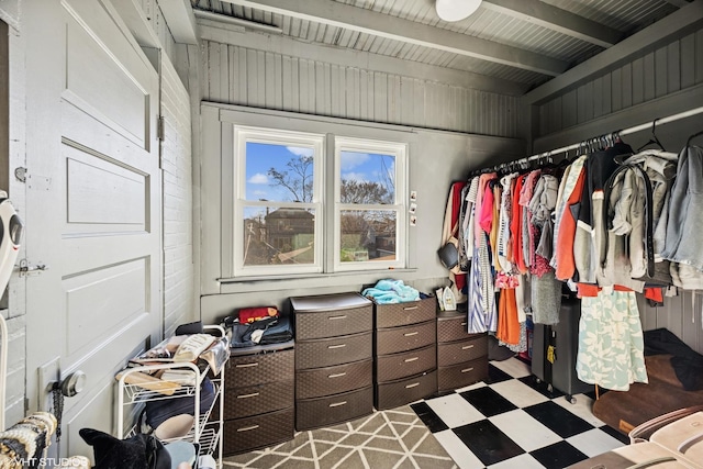 spacious closet with tile patterned floors