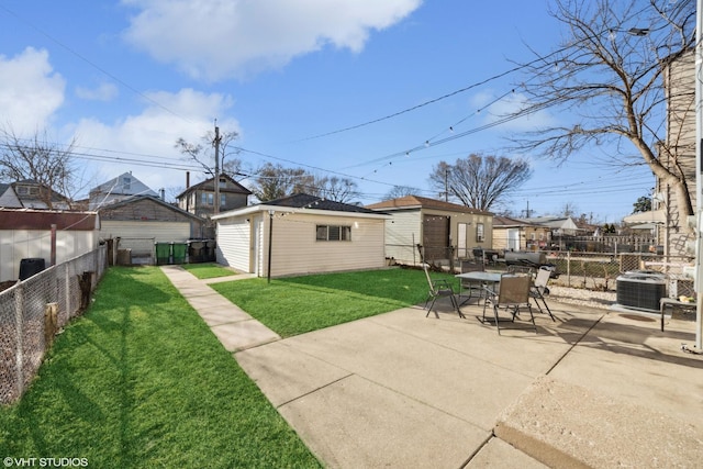 exterior space featuring a patio, a fenced backyard, cooling unit, and a lawn