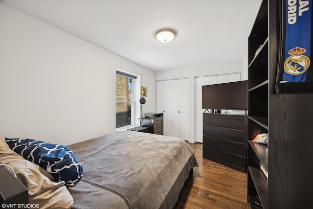 bedroom featuring dark wood-style floors