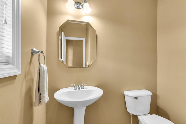 half bathroom with toilet