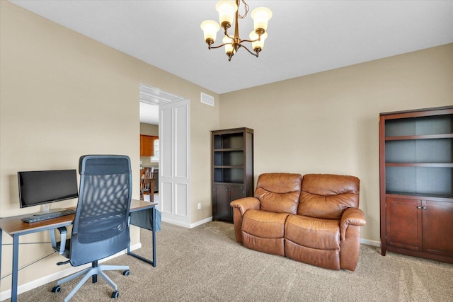 carpeted home office featuring visible vents, baseboards, and a notable chandelier