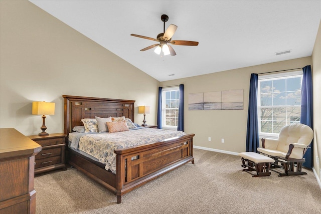 carpeted bedroom featuring baseboards, visible vents, ceiling fan, and lofted ceiling