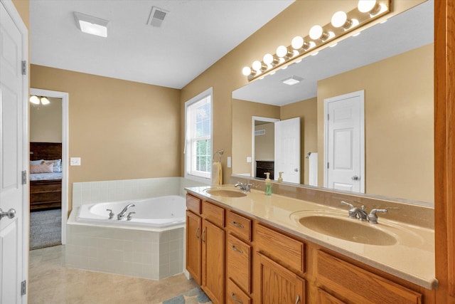 full bath with double vanity, visible vents, a sink, and a bath