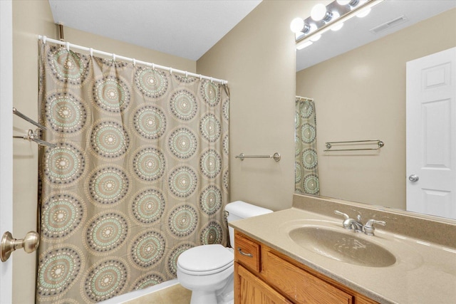 3407 Weeping Cherry Ct, Champaign, IL 61822 - bathroom with vanity, a shower with shower curtain, toilet, and visible vents