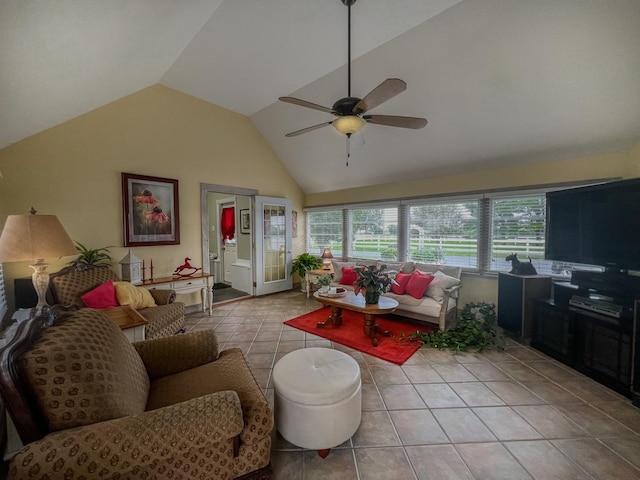 tiled living area featuring ceiling fan and lofted ceiling