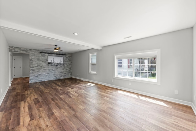 120 Anderson Ave, Joliet, IL 60433 - unfurnished living room featuring wood finished floors, baseboards, ceiling fan, and recessed lighting
