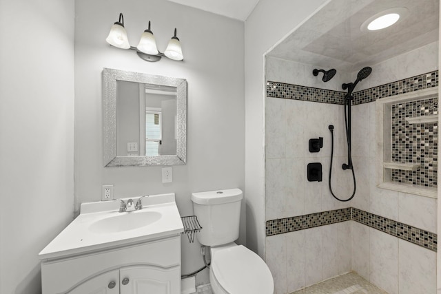 120 Anderson Ave, Joliet, IL 60433 - bathroom featuring tiled shower, toilet, and vanity