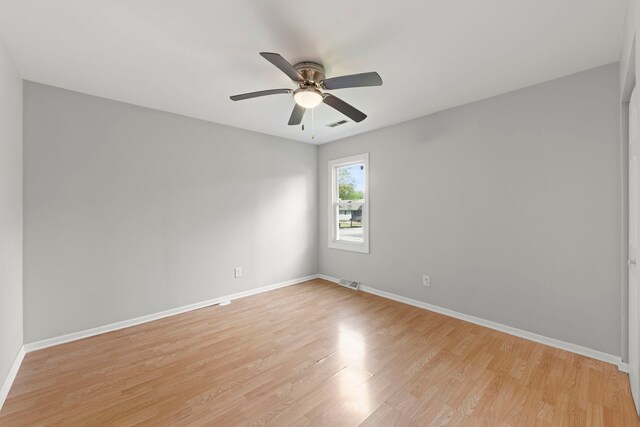 120 Anderson Ave, Joliet, IL 60433 - unfurnished room featuring baseboards, light wood-type flooring, and ceiling fan