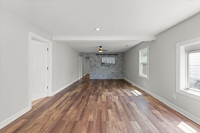 120 Anderson Ave, Joliet, IL 60433 - unfurnished living room with healthy amount of natural light, wood finished floors, a ceiling fan, and baseboards