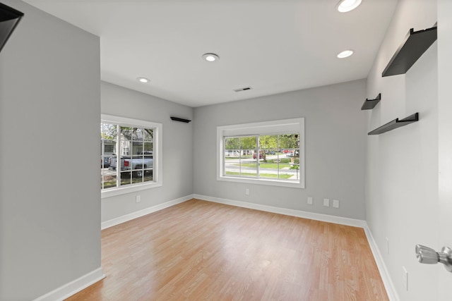 120 Anderson Ave, Joliet, IL 60433 - spare room with light wood-style flooring, baseboards, and recessed lighting