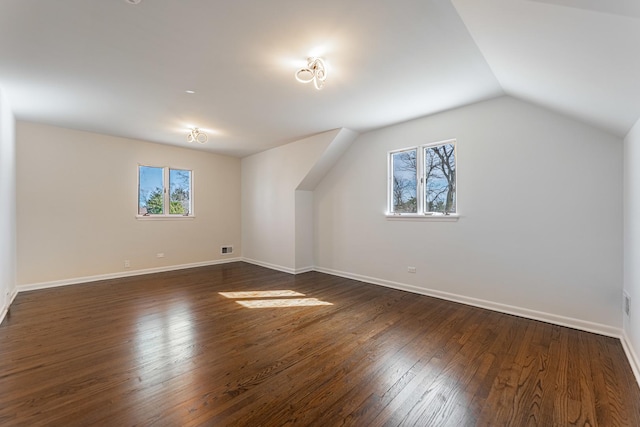 4313 Elm Ave, Lyons, IL 60534 - additional living space with dark wood finished floors and vaulted ceiling