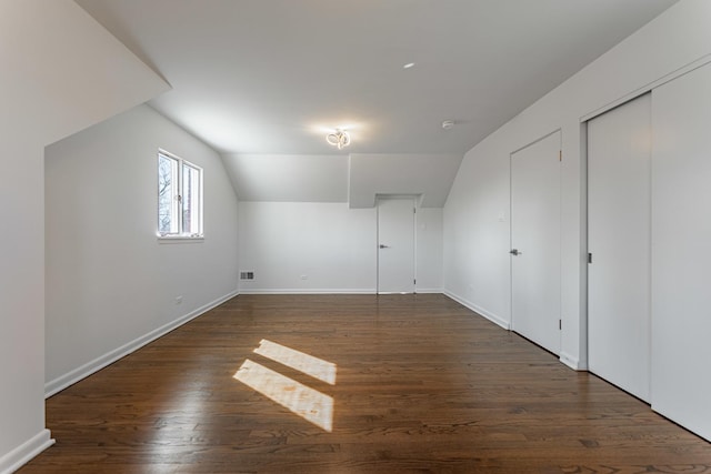 4313 Elm Ave, Lyons, IL 60534 - additional living space featuring vaulted ceiling and dark wood-style floors